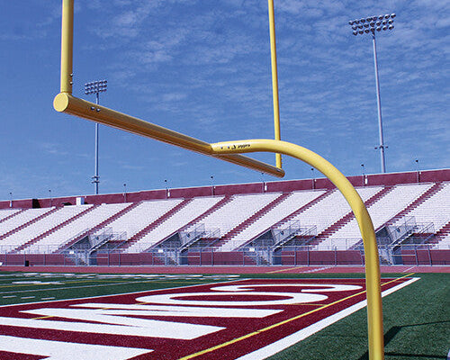 Yellow high school football goal posts with 6-5/8 inch aluminum pole and 6-foot offset installed in stadium end zone