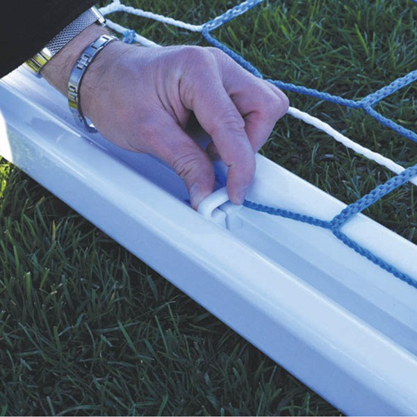 Easy Track Net Clip being inserted in the Channel