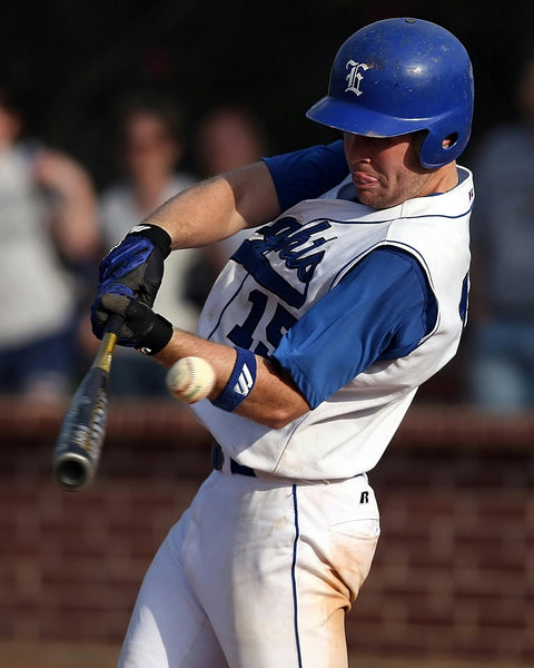 Baseball Player Hitting