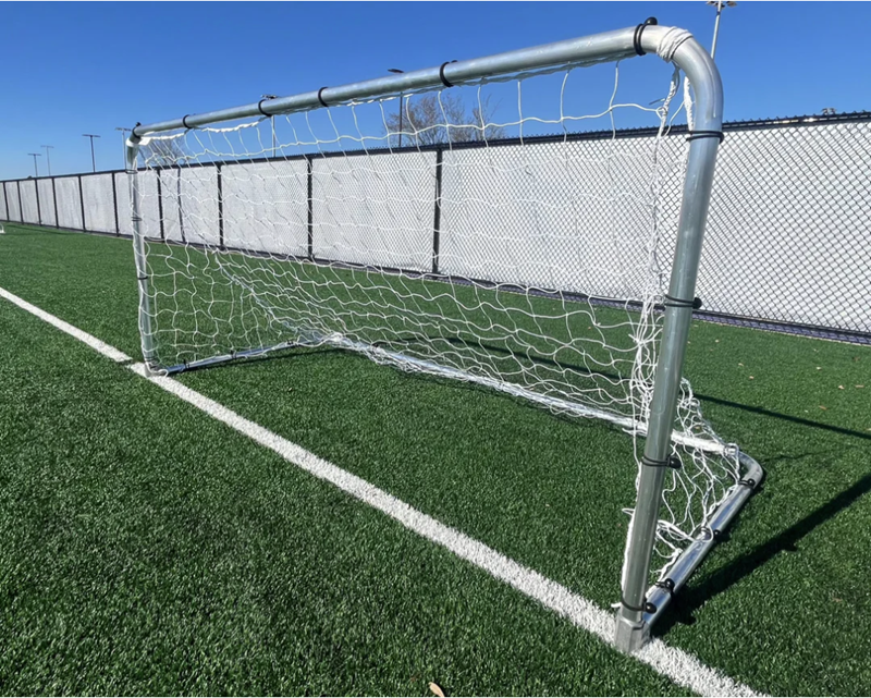Pevo 4.5x9 Small Youth Soccer Goal Made in USA – 2 Inch Round Aluminum Backyard Training Goal with Net on Turf Field | Goals4Sports®