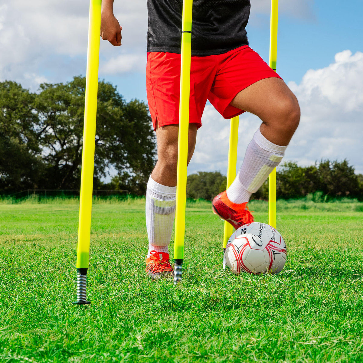 Outdoor Agility Poles with Soccer Player