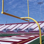 Yellow high school football goal posts with 6-5/8 inch aluminum pole and 6-foot offset installed in stadium end zone