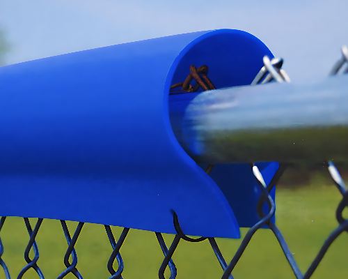 Royal blue fence top protector guard installed on a chain link fence for baseball field and sports facility safety