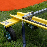 Close-up of Mound Taxi wheel, strap, aluminum rail, and locking pin assembly