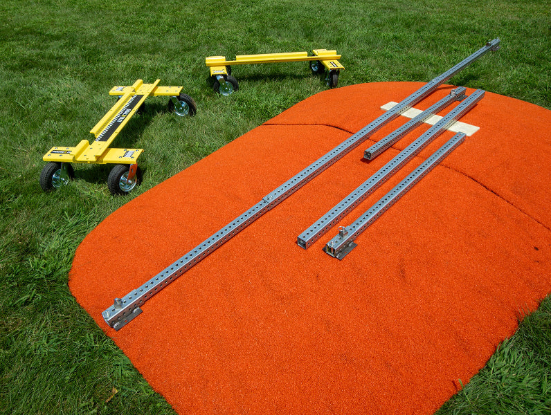 Mound Taxi extension bars and Goal Taxi units laid out on portable pitching mound