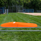 Mound Taxi transport frame positioned in front of baseball field and dugouts