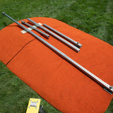 Mound Taxi extension kit laid out on top of orange portable pitching mound