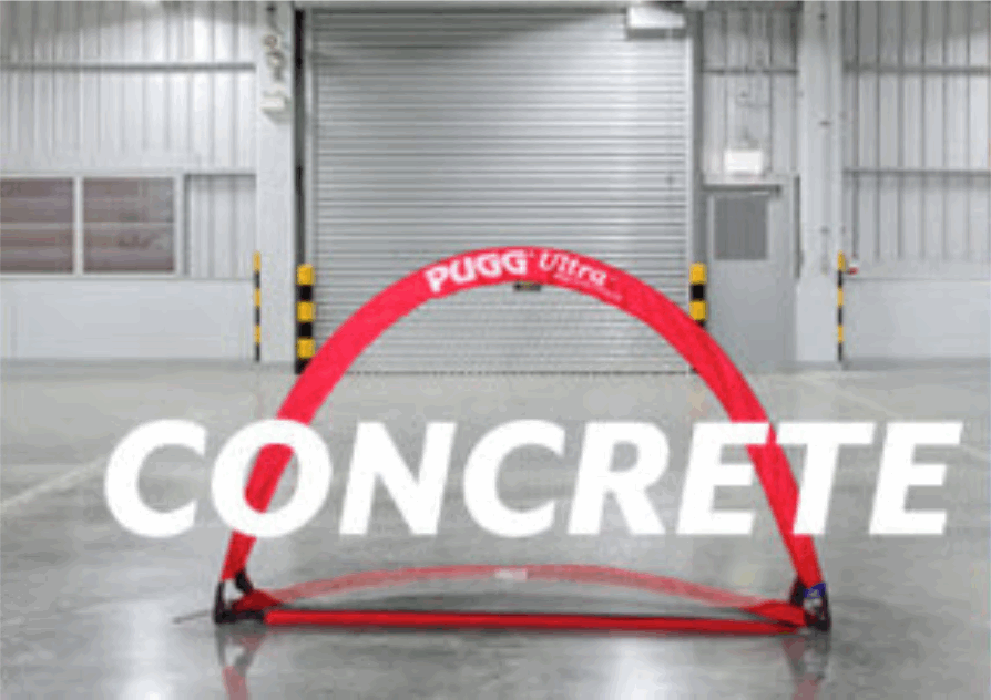 PUGG Ultra Weighted Pop-up Goal on Concrete