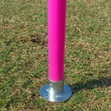 Pink Unbreakable Pro Agility Poles in the ground