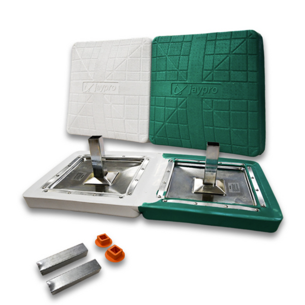 Jaypro green and white double first base shown with metal anchor hardware and orange plugs on a white background
