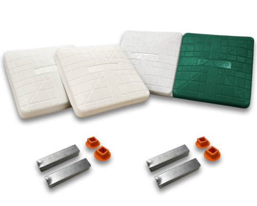 Jaypro Pro-Style Hollywood base set with two white bases, one green-and-white double first base, four metal anchors, and four orange plugs.