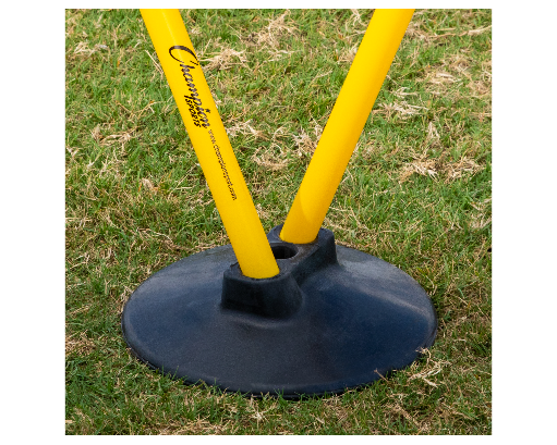 Pro Agility Pole Set outdoor setup on grass field showing angled yellow agility poles in rubber bases