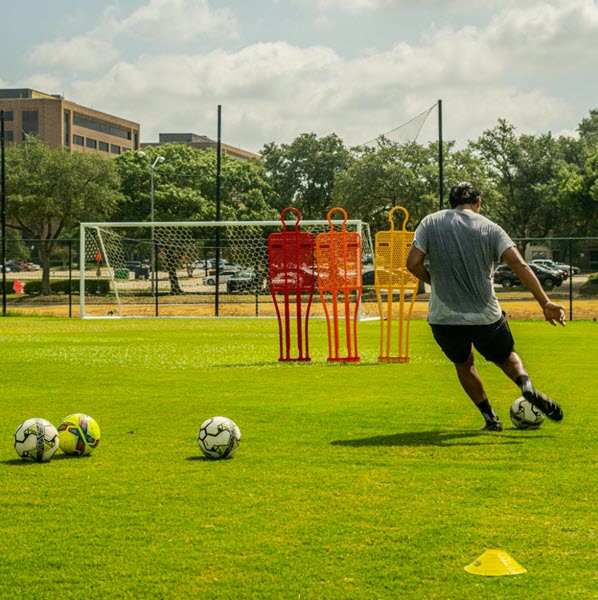 Pro soccer training mannequin standing 6ft tall on grass