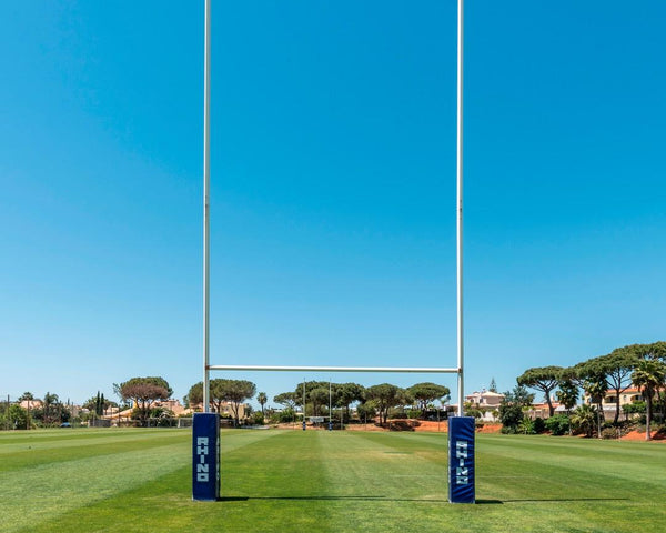 H-shaped rugby goalposts installed on a grass field for school, college, and club rugby programs