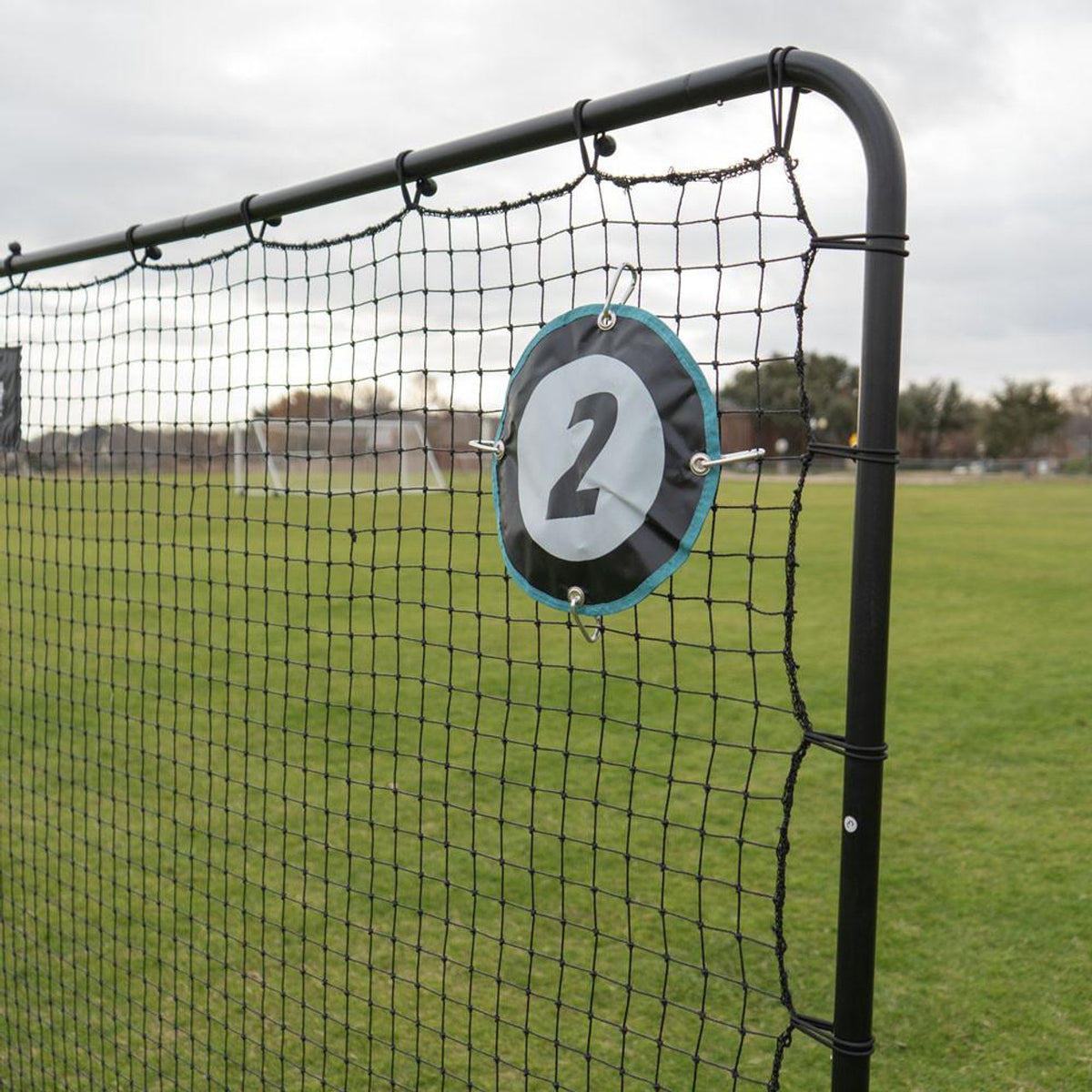 Net with a target labeled '2' on a sports field