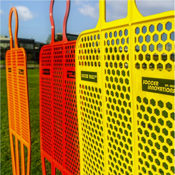 Soccer mannequin training aid for artificial turf fields