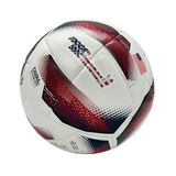 Spark Soccer Ball 2026 USA edition size 5 in red white and blue on grass with goal net in background