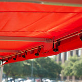 MVP team shelter replacement cover interior showing bungee attachment system and red weather-resistant canopy fabric