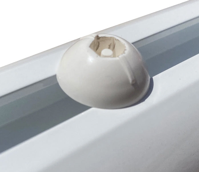 Close-up of soccer goal channel system with tamper-proof clips